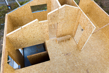 Construction of new and modern modular house. Walls made from composite wooden sip panels with...