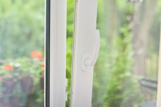 Glass Open White Plastic Door To The Balcony Terrace