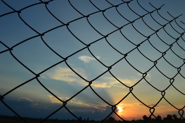 fence on background of blue sky
