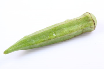 Fresh raw okra isolated on white background