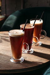 Hot fruit drinks in cafe, three types.