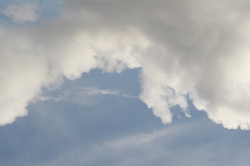 white clouds against a blue sky