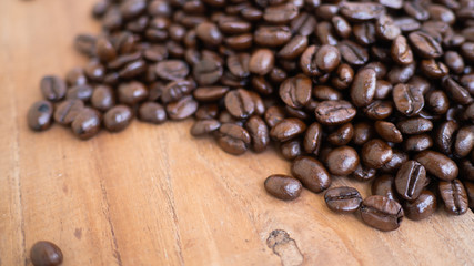 dark rose coffee bean, Black coffee cup on old wooden table top view.