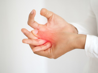 rheumatoid arthritis and repetitive motion injuries,including carpal tunnel syndrome in woman and she touching on her wrist and symptoms of pain and swelling in the hand use for health care concept. - obrazy, fototapety, plakaty