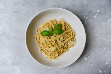 Restaurant food delivery lunch at home. spaghetti with Parmesan cheese and herbs. food delivery to quarantine COVID-19. recipe homemade pasta. classic Italian cuisine. selective focus