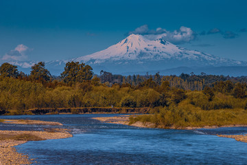 volcano osorno viewpoints blue water cabulco villarica chile volcan thaw river snow on top chile...