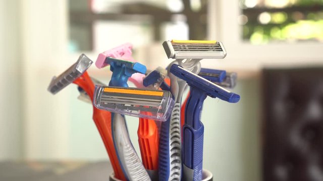 Disposable plastic razor or used blades. Bathroom waste