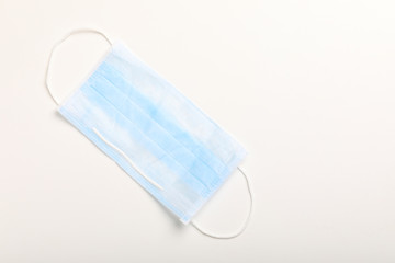 Medical mask for protection against flu and corona virus on white background