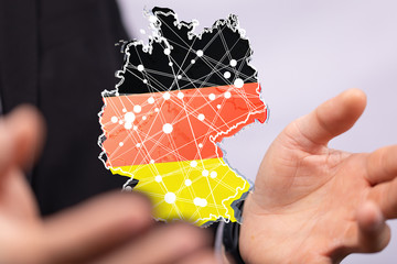 a virtual germany land  map digital in hand 3d