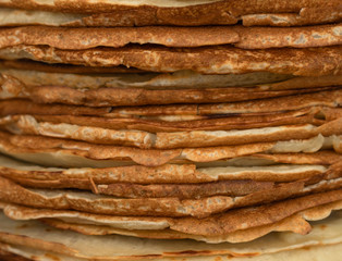Homemade thin fresh crepes for breakfast or dessert. Close up