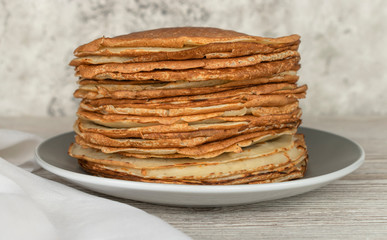 Homemade thin fresh crepes . Close up