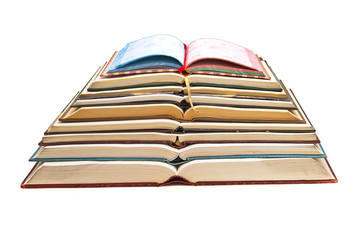 Books stacked on white background.