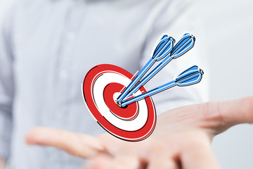 Dart arrow on target dartboard, Business success concept..