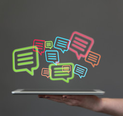 Digital icons with colorful dialog speech bubbles.