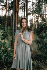 Naklejka premium Portrait of romantic woman in fairy forest