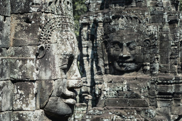 Face statues of Angkor temple, Cambodia,