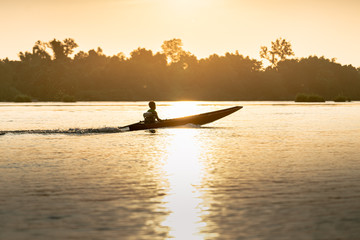 traditional fisherman boat from laos on the 4000 islands during sunset, Laos