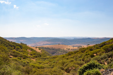 Obraz premium View to the green hills around Salalah Dhofar in Oman on Arabian Peninsula