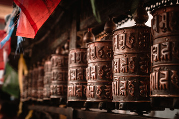 Fototapeta na wymiar Prayer wheel at Bodnath Stuppa, Kathmandu, Nepal