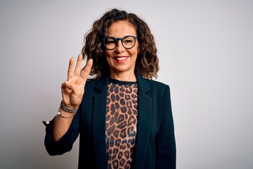 Middle age brunette business woman wearing glasses standing over isolated white background showing...