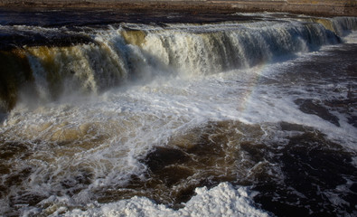 Waterfall on the river Narva. Variegated wide waterfall