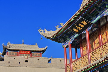 Fototapeta premium Wenchang Pavilion-three story tower over Guanghua Lou-Enlightenment Gate-E.gate Jiayu Pass-Jiayuguan-Gansu-China-0736