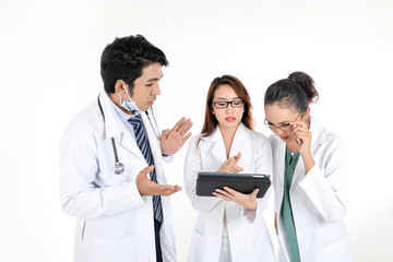 Fototapeta premium ung asian chinese malay male female doctor on white background holding pad tab disuses think talk share