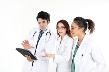 Fototapeta premium ung asian chinese malay male female doctor on white background holding pad tab disuses think talk share