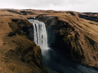 Aerial shot of most famous Iceland waterfall in autumn Skogafoss