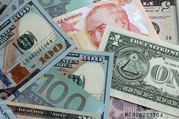 Fototapeta na wymiar US dollar bill,euro and Turkish money banknotes background,flat layout