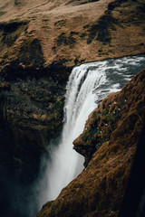 Close shot of most famous Iceland waterfall in autumn Skogafoss