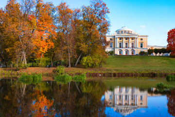 Fototapeta na wymiar Pavlovsk palace in golden autumn in Pavlovsky park, Saint Petersburg, Russia.