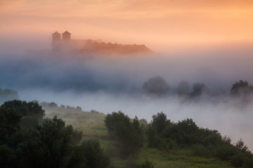 Obraz premium Benedictine monastery on the rocky hill by the Vistula river in Tyniec near Cracow, Poland