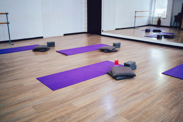 Empty gymnasium with fitness mats