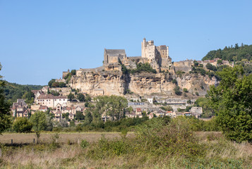 Fototapeta premium The medieval Chateau de Beynac rising on a limestone cliff above the Dordogne River. France, Dordogne department, Beynac-et-Cazenac