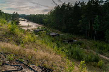 Fototapeta na wymiar Mine station of the 1st and 2nd World war, disguised by a forest on the shore of the Gulf of Finland on the Fort Krasnaya Gorka