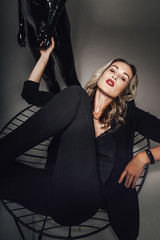 Fashion photography. Beautiful caucasian  woman and mannequin