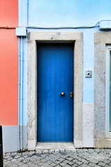 Old and colorful wooden door with iron details