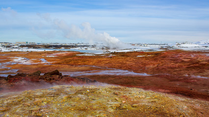 water vapour comes out of the ground in winter landscape