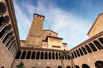Fototapeta premium Bologna, Basilica of Santo Stefano also called the Seven Churches, the church with the bell tower and the cloister. Emilia-Romagna, Italy, Europe