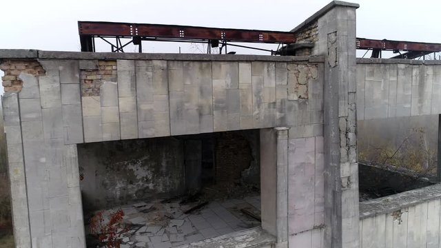 Video from a drone in an abandoned city of Pripyat in the Chernobyl exclusion zone. Hotel woodland. Palace of Culture Energetik in fog  3