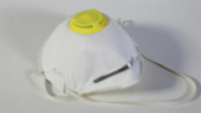 Antivirus protective mask on white background.