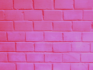 Pink brick wall background close up