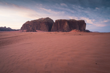 Fototapeta na wymiar Red sand dune in Wadi Rum desert in a morning sunrise, Jordan, Arab