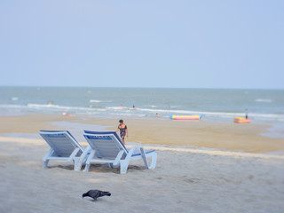 Two chairs on the beach, Cha-am, Thailand