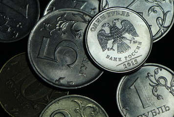 Russian Rubles on the black background. Coins 1, 2, 5, 10. :The bank of Russia"