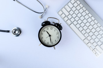 Conceptual,stethoscope on a white table