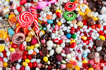 Fototapeta na wymiar Colorful many candies,chocolates and traditional Turkish Delight background.Conceptual image of celebrations.