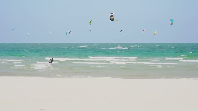 People doing kitesurfing and windsurfing at HuaHin beach,Thailand