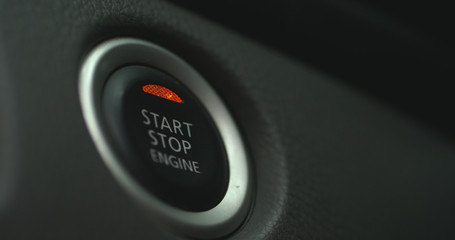 Car ignition button closeup image